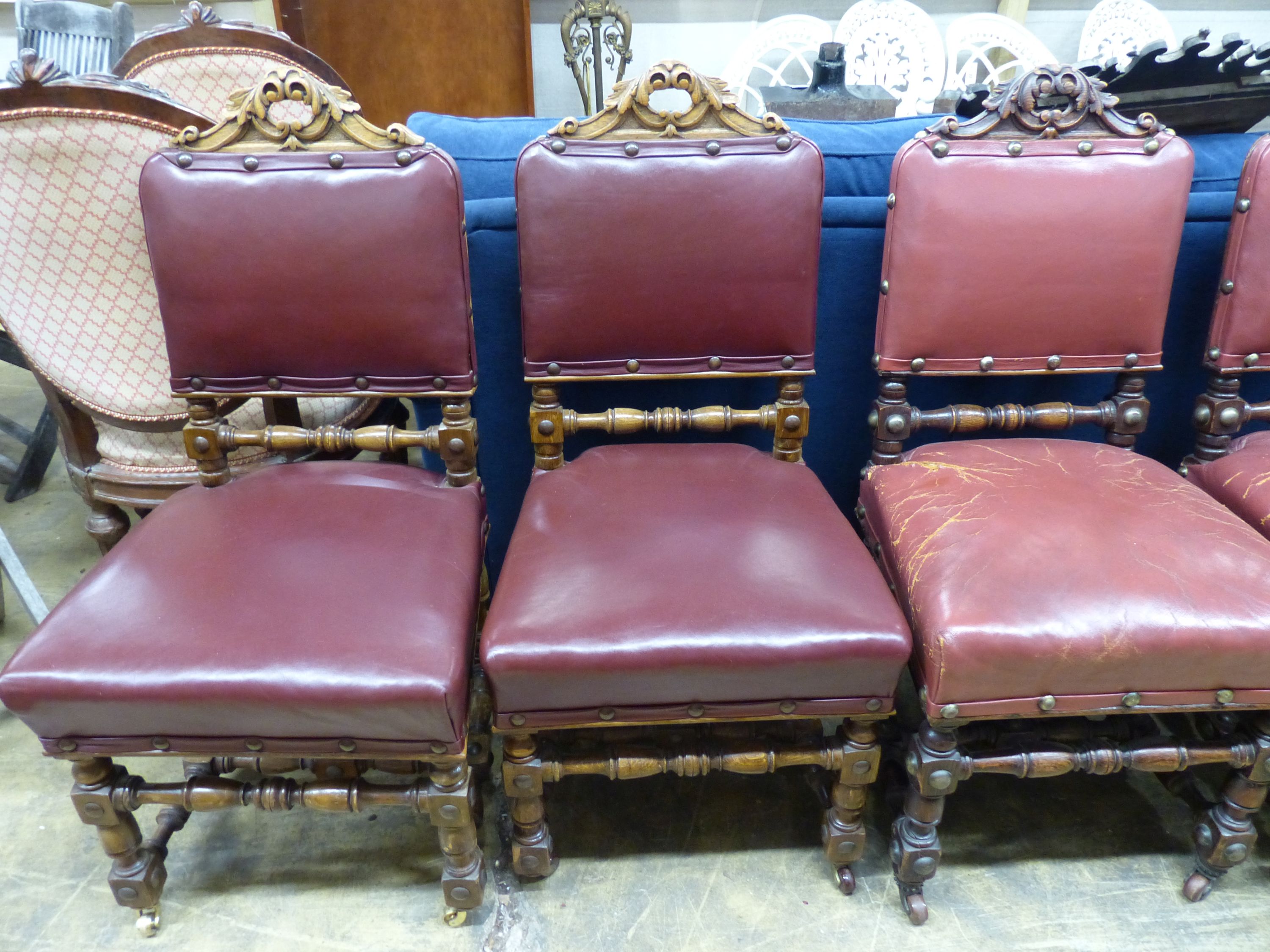 A set of ten Victorian 17th century style oak dining chairs